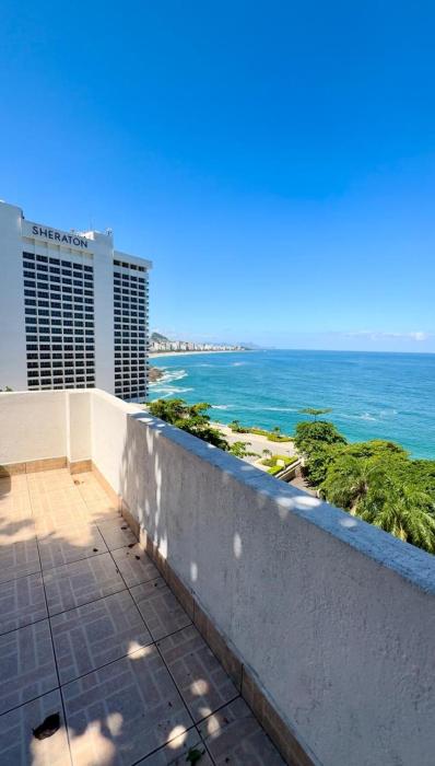 Quarto de frente para o mar