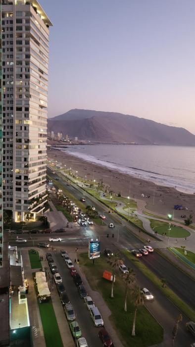 Iquique - Departamento ubicado frente a la Playa - Incluye Estacionamiento, Puesta de Sol y Mar - Reserva mínima 2 Noches