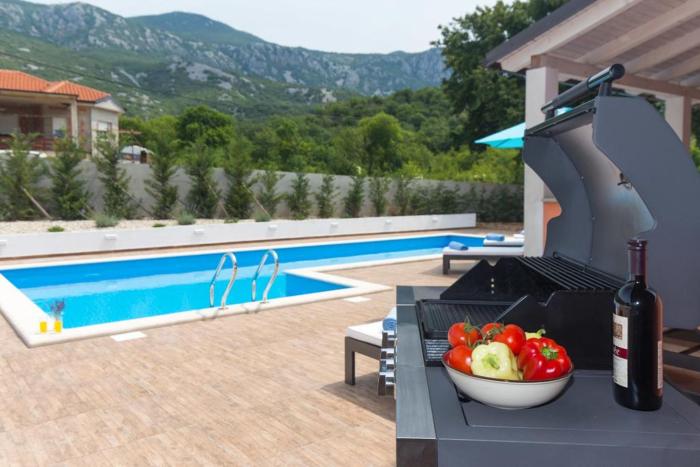 Villa Lavanda with relaxation spot of swimming pool in scented garden, outdoor terrace and barbecue