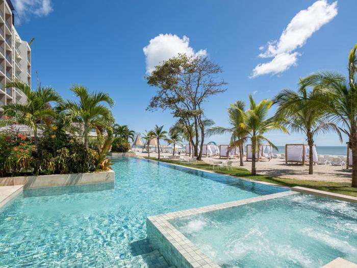 Playa Caracol Apt with Radisson Hotel Amenities