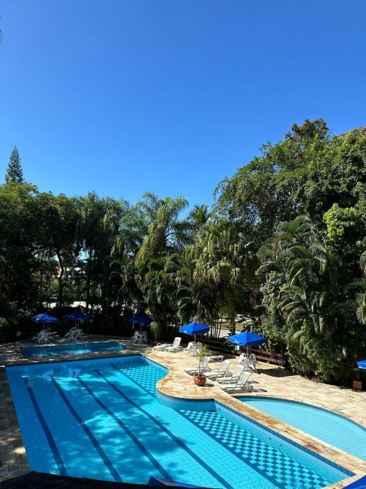 Flat Amarilis em Riviera São Lourenço - com arrumação, café manhã, wifi privat, toalhas praia e piscina e enxoval completo com trocas toalhas