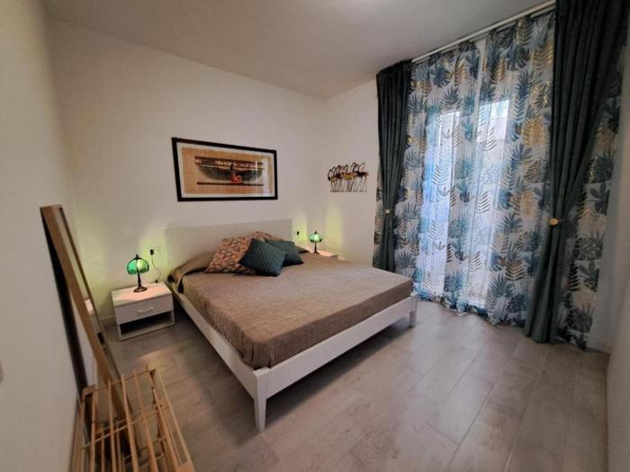 Splendido appartamento con piscina e vista mare