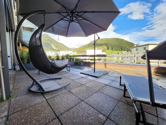 Stilvolles und ruhiges Apartment mit privater 60m2 Sonnenterrasse bei der Parsennbahn