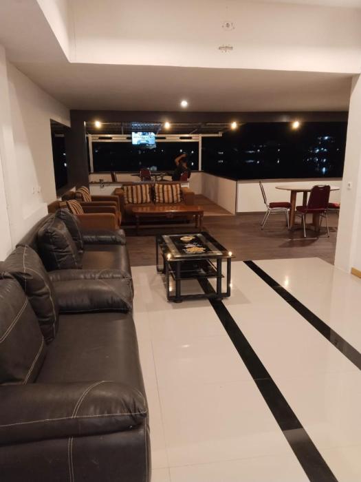 Wisma sidapore teluk bayur salakan