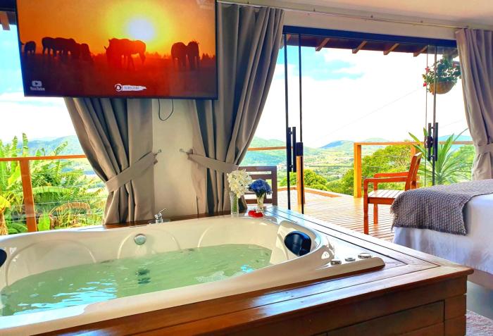 Recanto Pôr do Sol com banheira e lareira