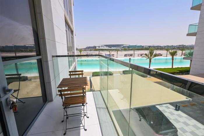 Stunning 1BR Retreat with Crystal Lagoon Views!