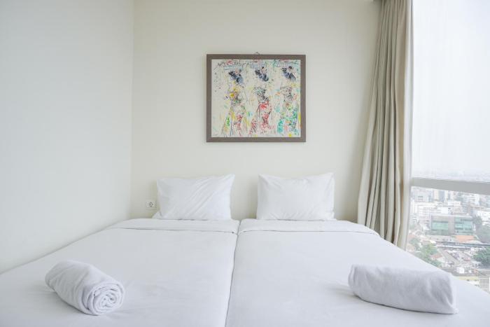 Nice and Elegant 2BR at 26th Floor Menteng Park Apartment By Travelio