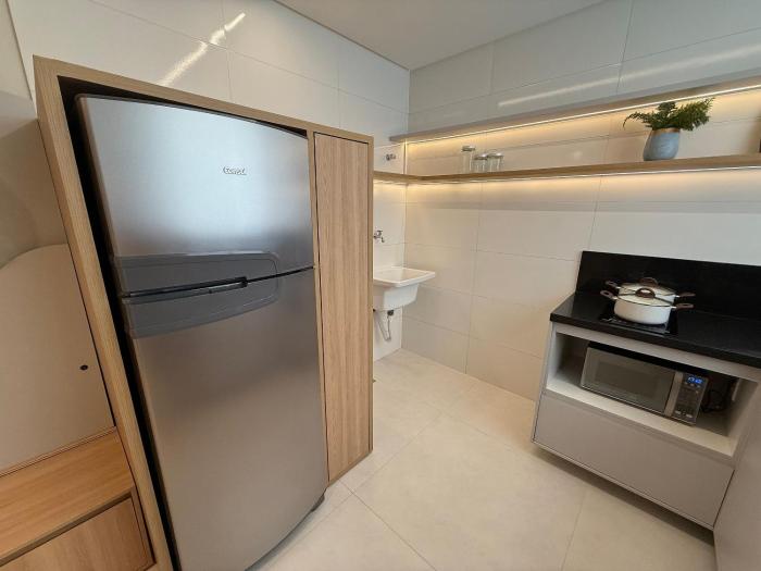 Apartamento com Suíte e sala climatizada