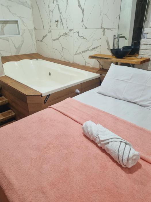 Quarto casal banheira
