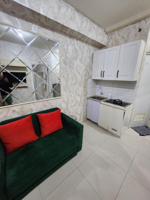 Green Pramuka by Santoso Family