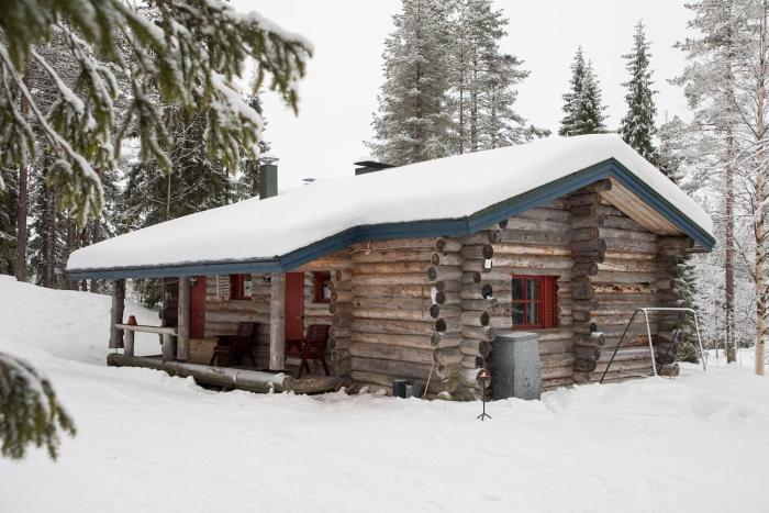 Erä 26, kahden makuuhuoneen kelomökki Syötteellä valaistun ladun vieressä