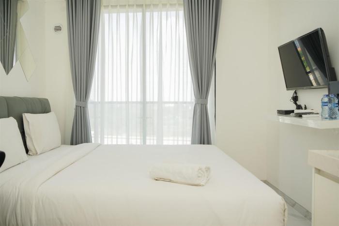 Nice and Homey Studio Room at Sky House BSD Apartment By Travelio
