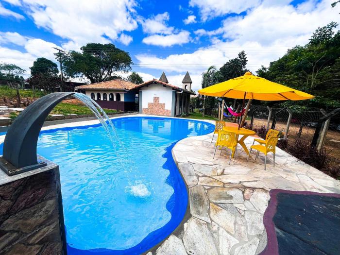 Pousada com vista para lago e com passeios de lancha em frente a Pousada em Capitólio, perto dos principais atrativos turístico, Pousada Vista do Turvo, Mandala