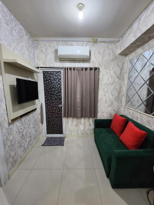 Green pramuka by Santoso Family