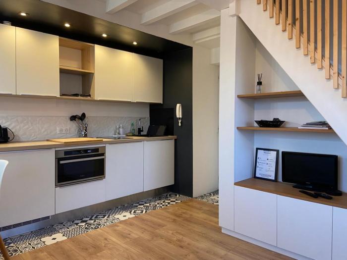 Élégant duplex neuf à 30 m de lOcéan avec parking