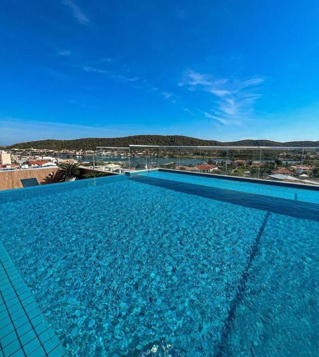 Flat 106 Aconchegante na Passagem - 700m da Praia