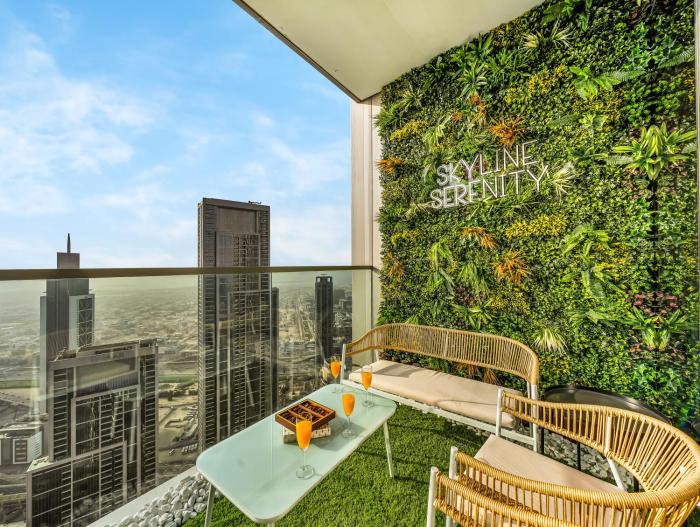 Skyline Serenity Holiday Home I Grande Signature 2 Bedroom Apartments I Persian Gulf Views I Free Parking, Gym, Pool & Wi-Fi