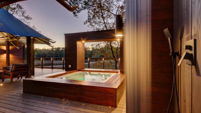 The Covery the Wren House a luxury African tent retreat on stocked bass pond