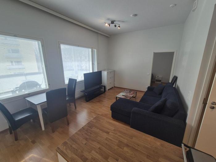 A one-bedroom apartment with a sauna