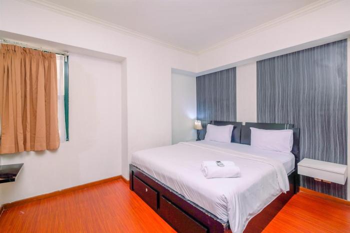 Comfort 2BR + Extra Room at Sudirman Tower Condominium Apartment By Travelio