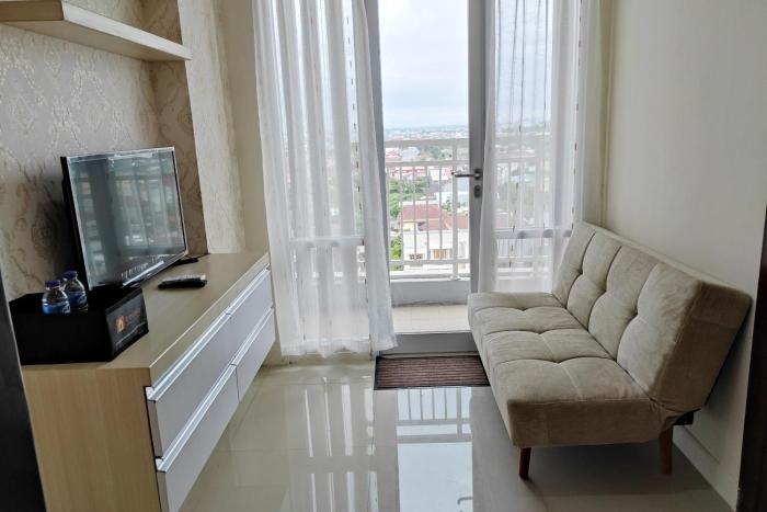 Simply and Clean 2BR Apartment at Vida View Makassar By Travelio
