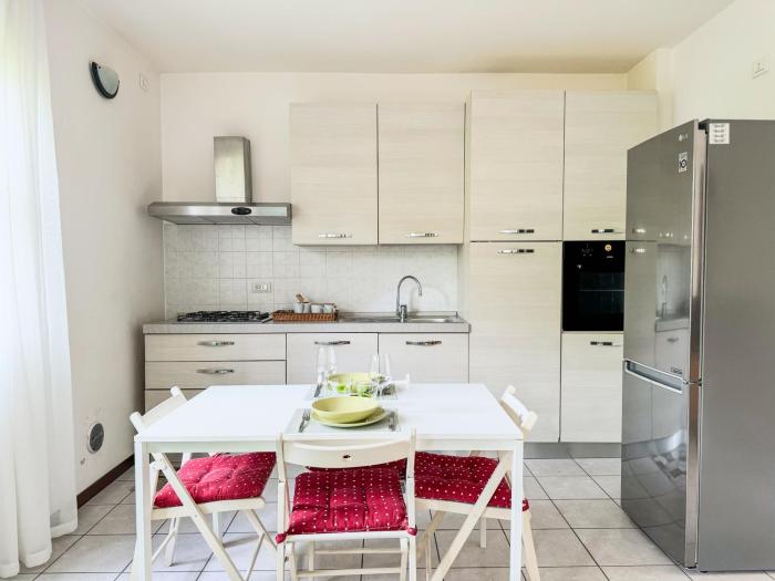 Two-room Apartment with garden and parking