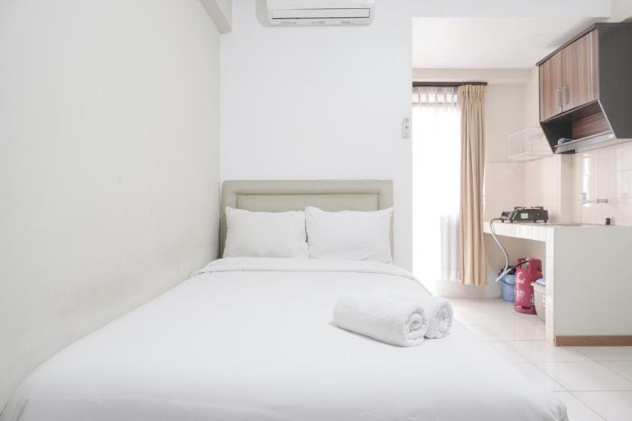 Restful and Simply Studio Apartment Green Palm Residence By Travelio