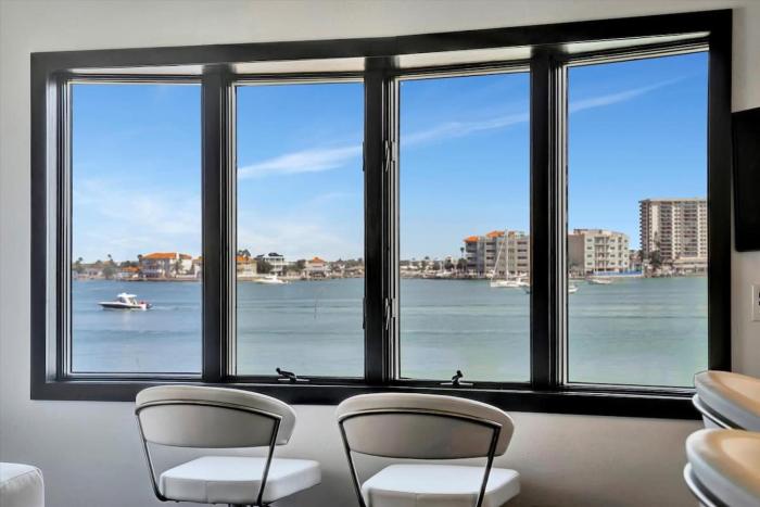 The Aura a Luxury Waterview Condo & heated pool