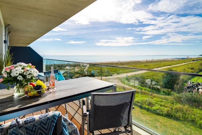 BeachWaveThree- 2OG, barrierearm, Meerblick, Balkon, Kamin, Sauna