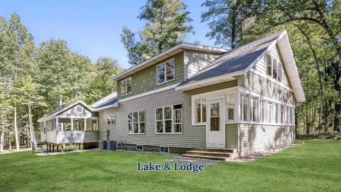 Impressive Dual Woods and Lake Homes That Sleep 32