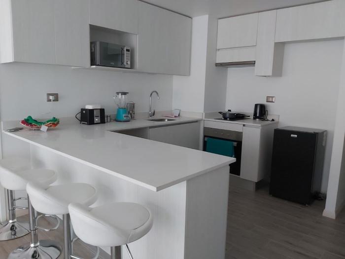 Hermoso depto Matrimonial Ed Puerto Nuevo COD907