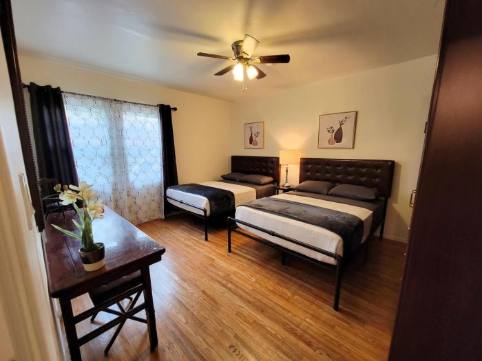 Perfectly located Pico Robertson ground floor 3 bedroom apartment Walk to restaurants WIFI TV Game Console Parking 5 minutes to Rodeo Drive