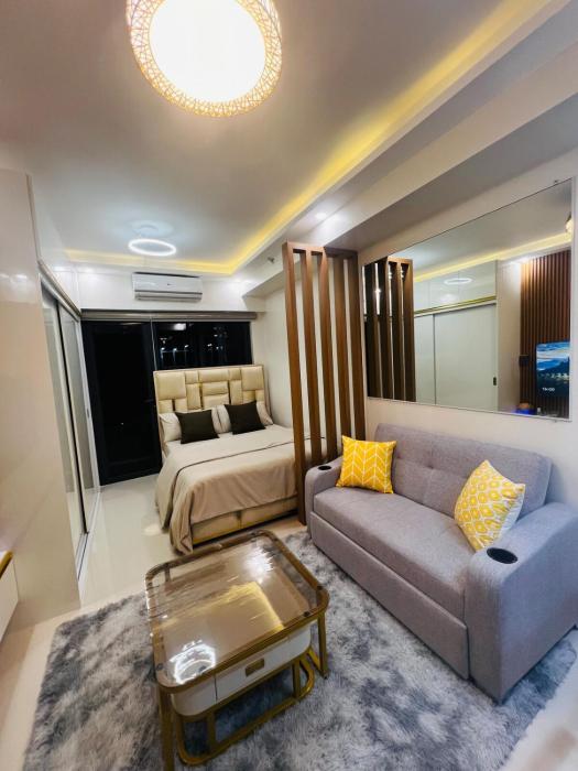 Modern Makati Condo with Balcony & Cityscape Views