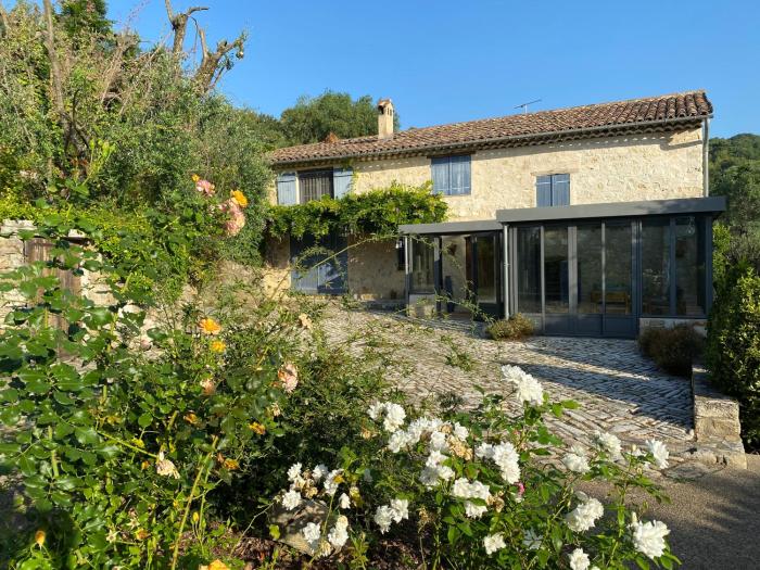 Guest house with tennis court