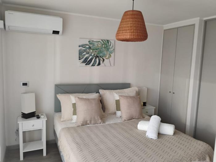 HOM I Wifi AireA Piscina Metro SantaIsabel Parking