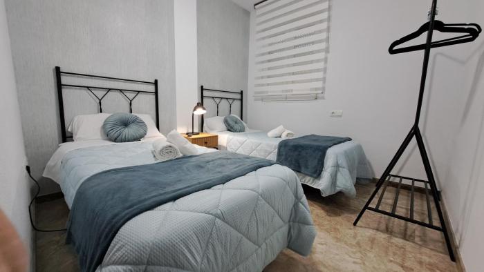 Apartamentos Maria Cristina con parking privado gratis