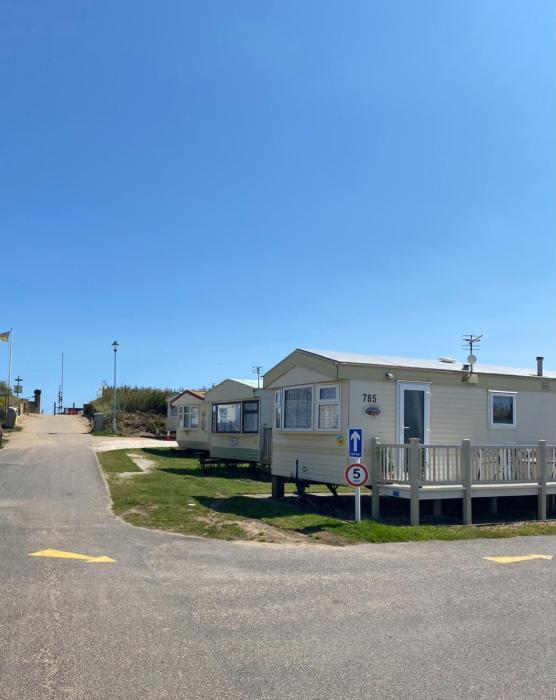 Promenade park 8 Berth caravan next to the beach entrance, WIFI included