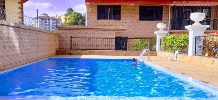 celestial three bedroom apartment with heated swimming pool fully equipped gym ample parking space children playing ground and a relaxing rooftop with amazing scenic views