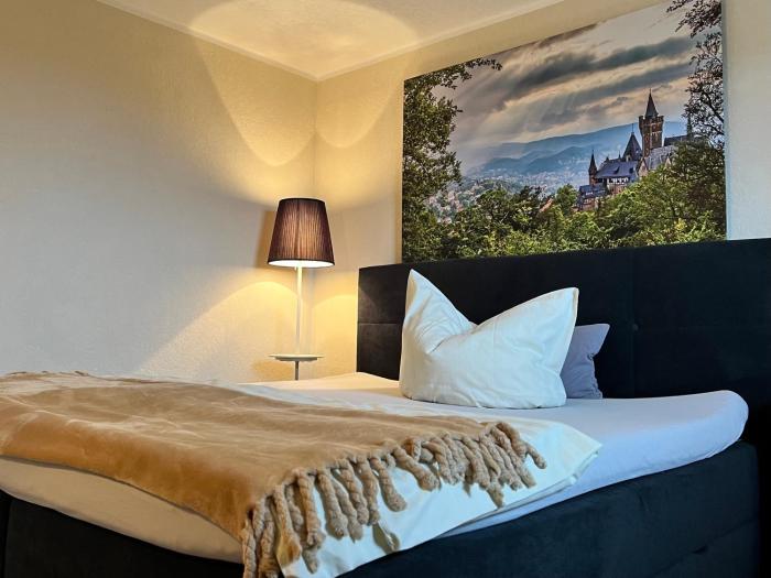 Harzträume 4 - Apartment mit zwei Schlafzimmern, WLAN, Parkplatz & Sitzplatz im Grünen I Busanbindung & Self Check-in