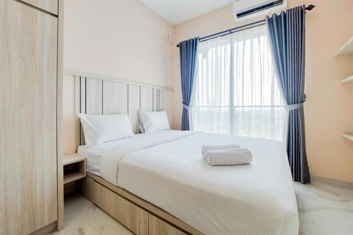 Cozy Design Studio at 21st Floor Sky House BSD Apartment By Travelio