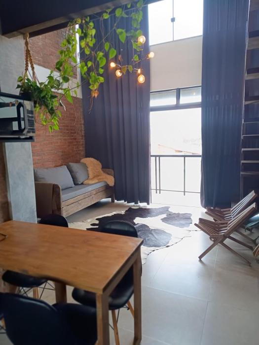 loft charmoso com lareira, a beira mar
