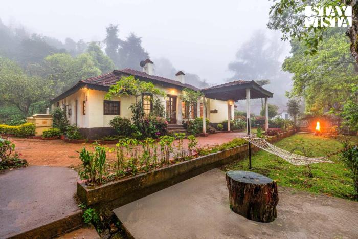 StayVista at Serenity of Sunny Side with TV, Lawn, Lake View