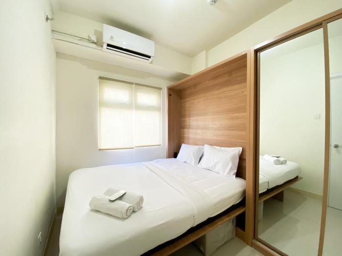 Comfort and Strategic 2BR at Green Pramuka City Apartment By Travelio