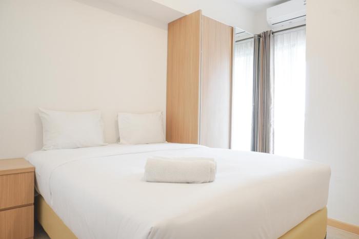 Cozy and Simply Look 2BR Apartment at M-Town Residence By Travelio