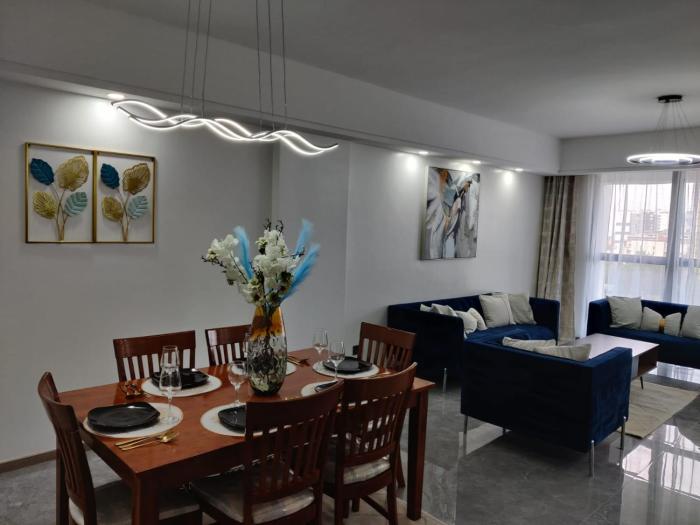 metro living retreat three bedroom apartment with swimming pool, fully equipped gym, ample parking space, and proximity to major shopping malls