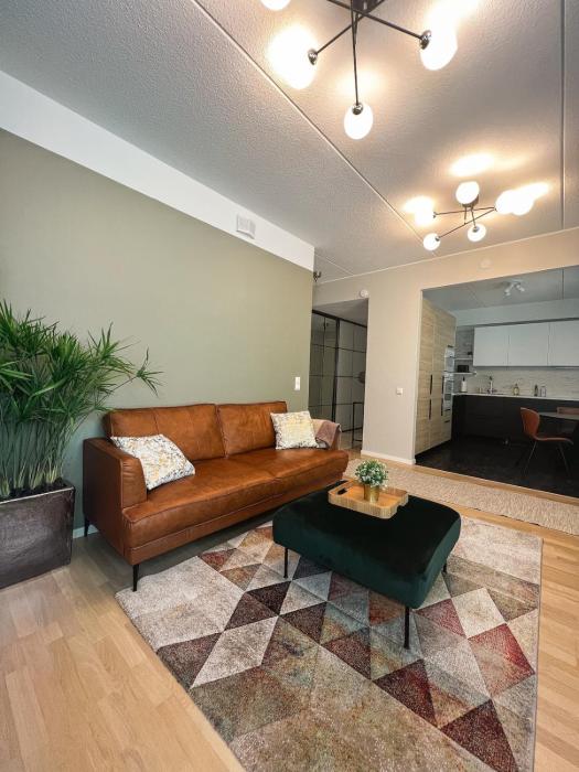 Lovely 1-bedroom apartment with patio and sauna