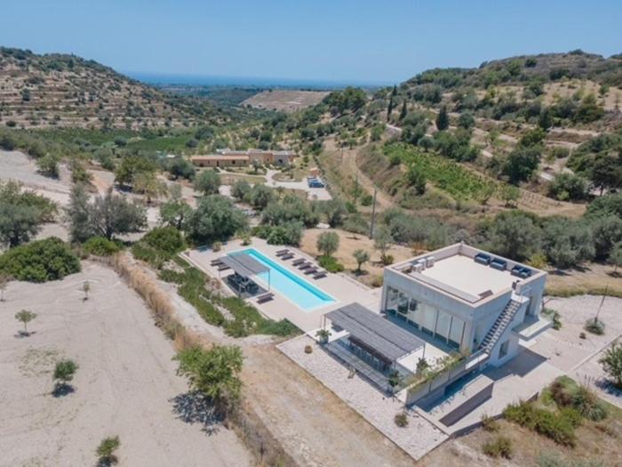 Amazing property of 2 villas on a land sea view