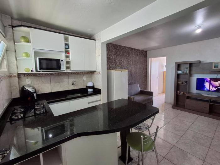 Apartamento no Centro do Arroio a 1 quadra do mar