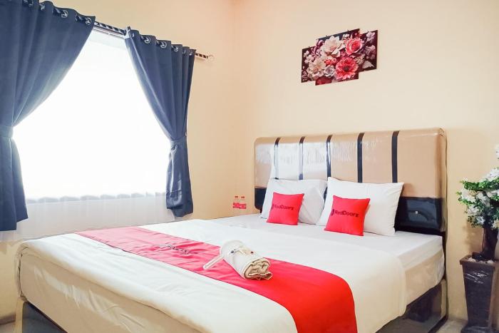 RedDoorz at Homestay OTW Manna