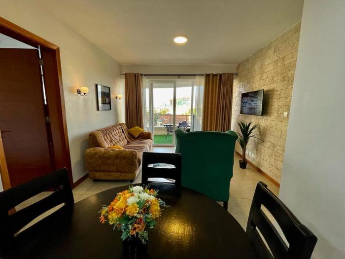 newly furnished two bedroom apartment with swimming pool, fully equipped gym, private parking space,children playground and unbeatable scenic city views